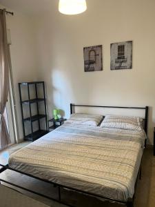 A bed or beds in a room at Il Fante locazione turistica