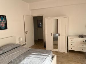 A bed or beds in a room at Il Fante locazione turistica