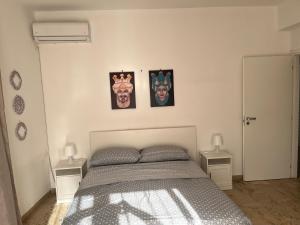 A bed or beds in a room at Il Fante locazione turistica