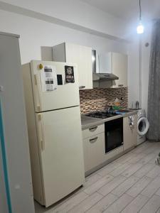 A kitchen or kitchenette at Il Fante locazione turistica