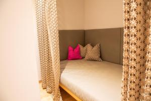 Letto o letti in una camera di Hotel Alpenblick
