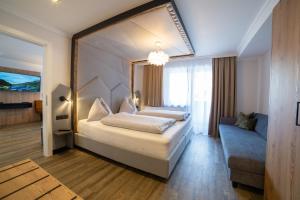 Letto o letti in una camera di Hotel Alpenblick