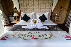 Postel nebo postele na pokoji v ubytování Padi Bali Retreat