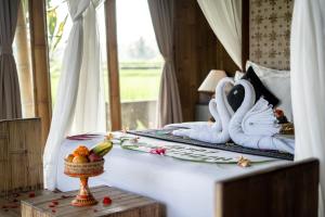 Postel nebo postele na pokoji v ubytování Padi Bali Retreat