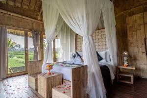 Postel nebo postele na pokoji v ubytování Padi Bali Retreat