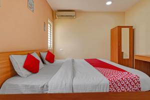 Letto o letti in una camera di Super Hotel O Indra Suites