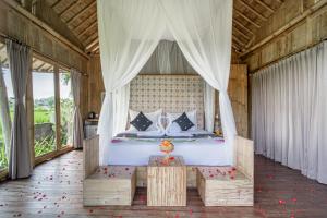 Postel nebo postele na pokoji v ubytování Padi Bali Retreat