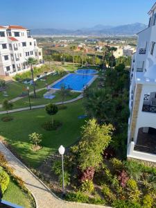 Bazén v ubytování Appartement climatisé vue piscine - Lilacs garden CaboNegro nebo v jeho okolí