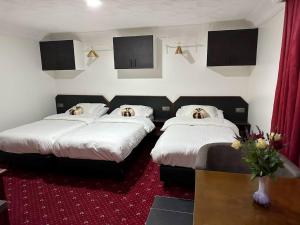 Postel nebo postele na pokoji v ubytování Hotel Eikenhof