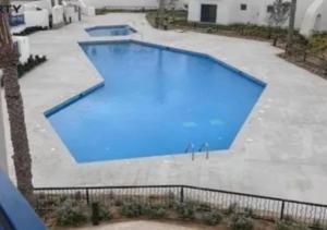 Bazén v ubytování Marassi North Coast مراسى الساحل الشمالى nebo v jeho okolí