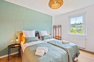 Ένα ή περισσότερα κρεβάτια σε δωμάτιο στο Sali Homes - Schwäbisch Hall, Altstadt #6