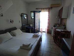 Posteľ alebo postele v izbe v ubytovaní Oasis Apartments
