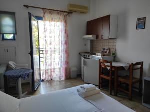 Kuchyňa alebo kuchynka v ubytovaní Oasis Apartments + 37 fotografií