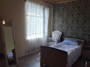 Postel nebo postele na pokoji v ubytování Aquarius
