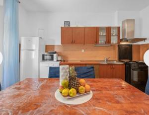 Kuchyň nebo kuchyňský kout v ubytování Apartman Arija-Pino