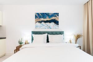 Posteľ alebo postele v izbe v ubytovaní PLATER PREMIUM APARTMENTS