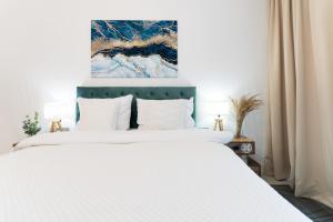 Posteľ alebo postele v izbe v ubytovaní PLATER PREMIUM APARTMENTS