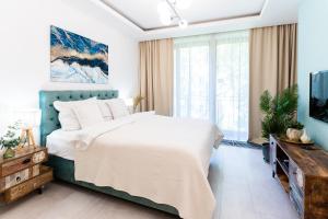 Posteľ alebo postele v izbe v ubytovaní PLATER PREMIUM APARTMENTS