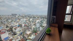 Nespecifikovaný výhled na destinaci Ho Či Minovo Město nebo výhled na město při pohledu z apartmánu