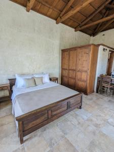 Ένα ή περισσότερα κρεβάτια σε δωμάτιο στο Meltemi Apartments