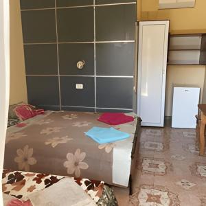 Postel nebo postele na pokoji v ubytování Baza otdykha Yantar