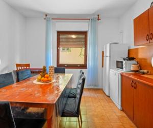 Kuchyň nebo kuchyňský kout v ubytování Apartman Arija-Pino