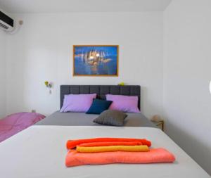 Postel nebo postele na pokoji v ubytování Apartman Arija-Pino