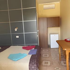 Postel nebo postele na pokoji v ubytování Baza otdykha Yantar