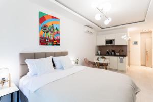 Posteľ alebo postele v izbe v ubytovaní PLATER PREMIUM APARTMENTS