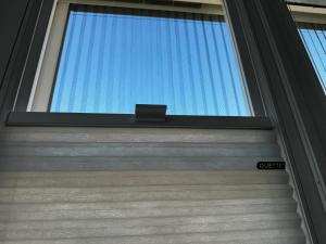 a close up of a door with a window at Big-Kurstadtapartment Baden-Baden in Baden-Baden