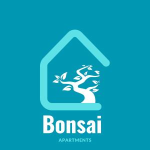 Et logo, certifikat, skilt eller en pris der bliver vist frem på Bonsai Apartment III