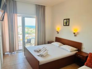 Postel nebo postele na pokoji v ubytování Apartments Aga