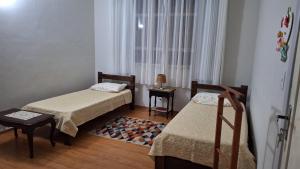 Giường trong phòng chung tại Schober's Casa próximo ao centro histórico!