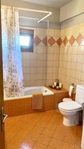 Koupelna v ubytování LenasApartment + 16 fotografií