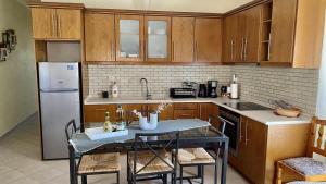 Kuchyň nebo kuchyňský kout v ubytování LenasApartment