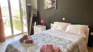 Postel nebo postele na pokoji v ubytování LenasApartment