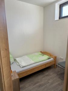 Postel nebo postele na pokoji v ubytování Ferienwohnung Zeitler