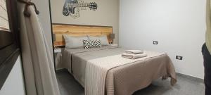 Cama o camas de una habitación en CASA JOSE "Acogedor Apartamento cerca de la playa"