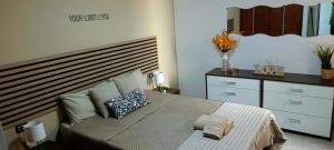 Cama o camas de una habitación en CASA JOSE "Acogedor Apartamento cerca de la playa"