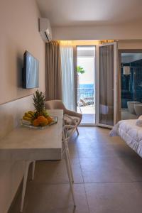TV a/nebo společenská místnost v ubytování Aura Room