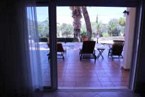 Μπαλκόνι ή βεράντα στο PortoRafti seaview garden Villa
