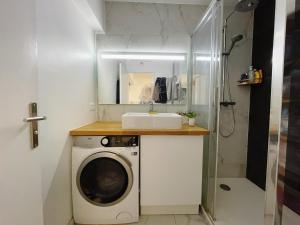 Ванная комната в Appt 2 Chambres Vue Tour Eiffel