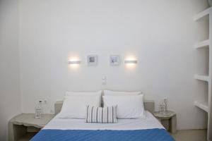 Postel nebo postele na pokoji v ubytování Aster house Agios Sostis