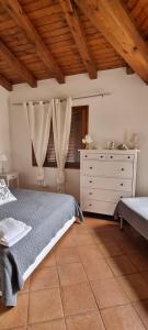 Postel nebo postele na pokoji v ubytování Q HOME San TEODORO