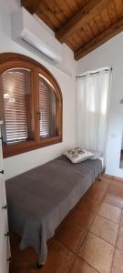 Postel nebo postele na pokoji v ubytování Q HOME San TEODORO