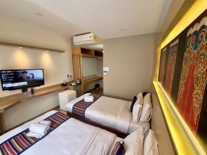 Sjónvarps- og/eða afþreyingartæki á ViaVia Boutique Hotel - Kathmandu