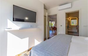 Łóżko lub łóżka w pokoju w obiekcie Pet Friendly Apartment In Madulin