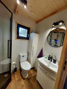 Kúpeľňa v ubytovaní Domek Clonowo