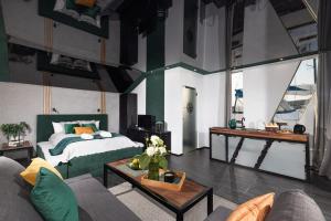 Giường trong phòng chung tại Domy Na Wodzie 3Miasto