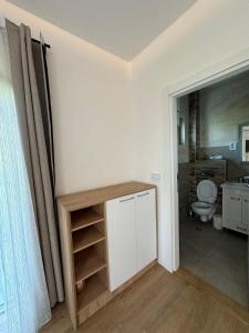 TV a/nebo společenská místnost v ubytování Apartman Igor